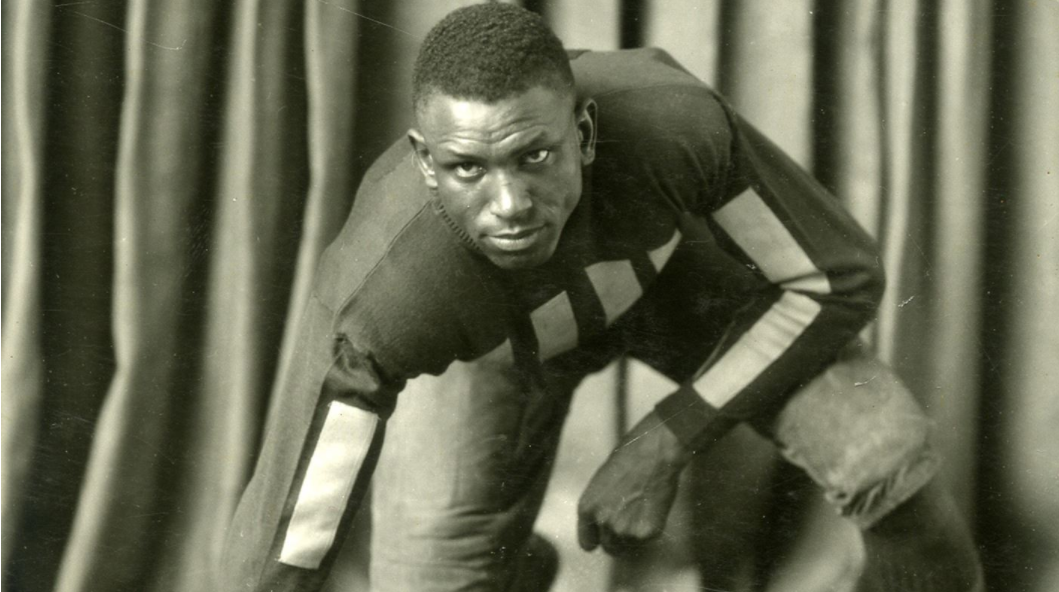 Holloway Smith in full body shot in a crouched position with one hand in front