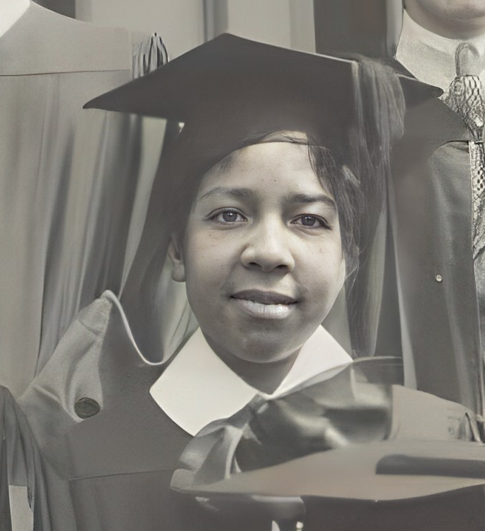 Headshot of Cora Mae Starland Trice Greene in high school graduation hat and robe 1919
