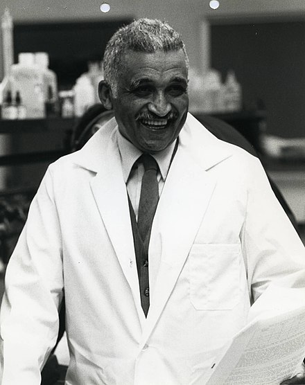 Photo of Samuel P Massie in a lab.